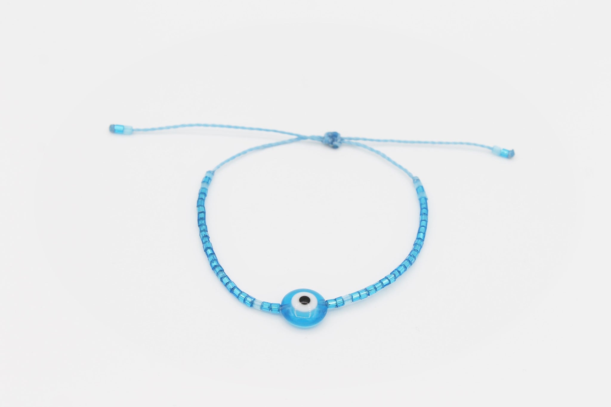 Evil Eye tiny seed beads blue